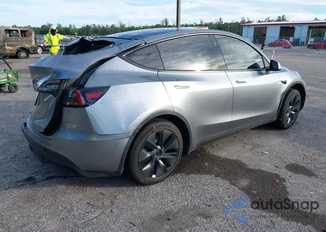 2025 Tesla Model Y Long Range Dual Motor Rear-Wheel Drive z USA, uszkodzony, nr VIN 7SAYGDED6SA373498